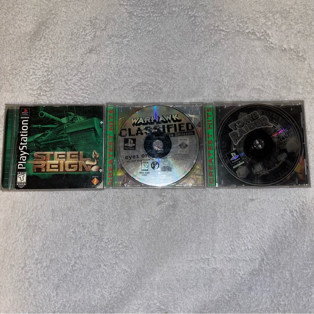 Vintage Sony play station Game Collection - Steel Reign, Warhawk, Tomb Raider